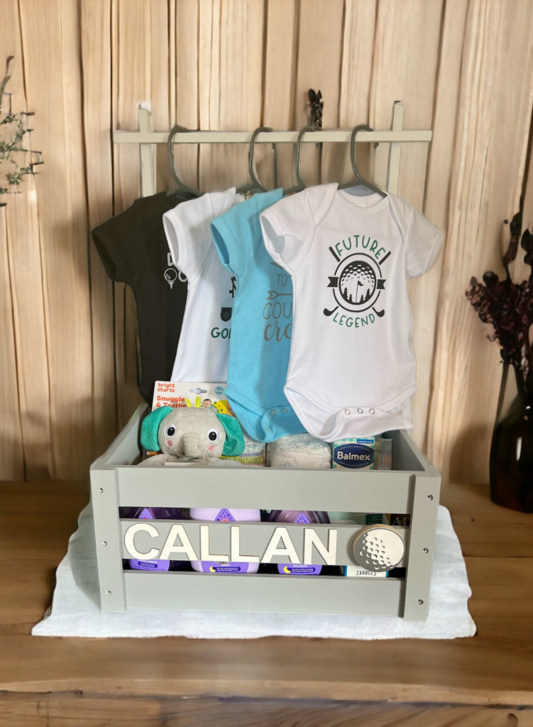 Adorable custom onesies and beautifully packaged gift boxes for baby showers by Creative Adventure Co.